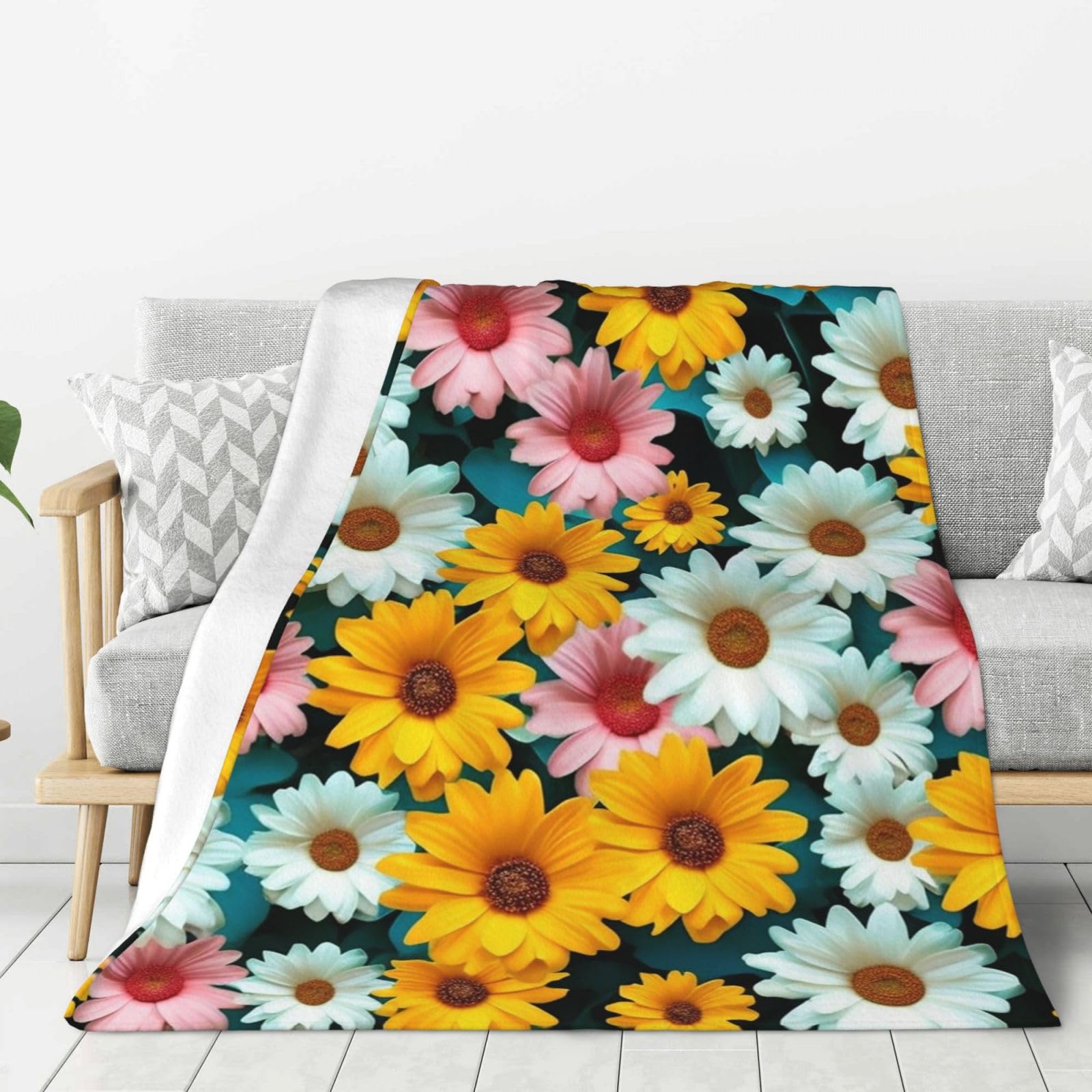 Couverture en flanelle douce pour des soirées cocooning sur le sofa