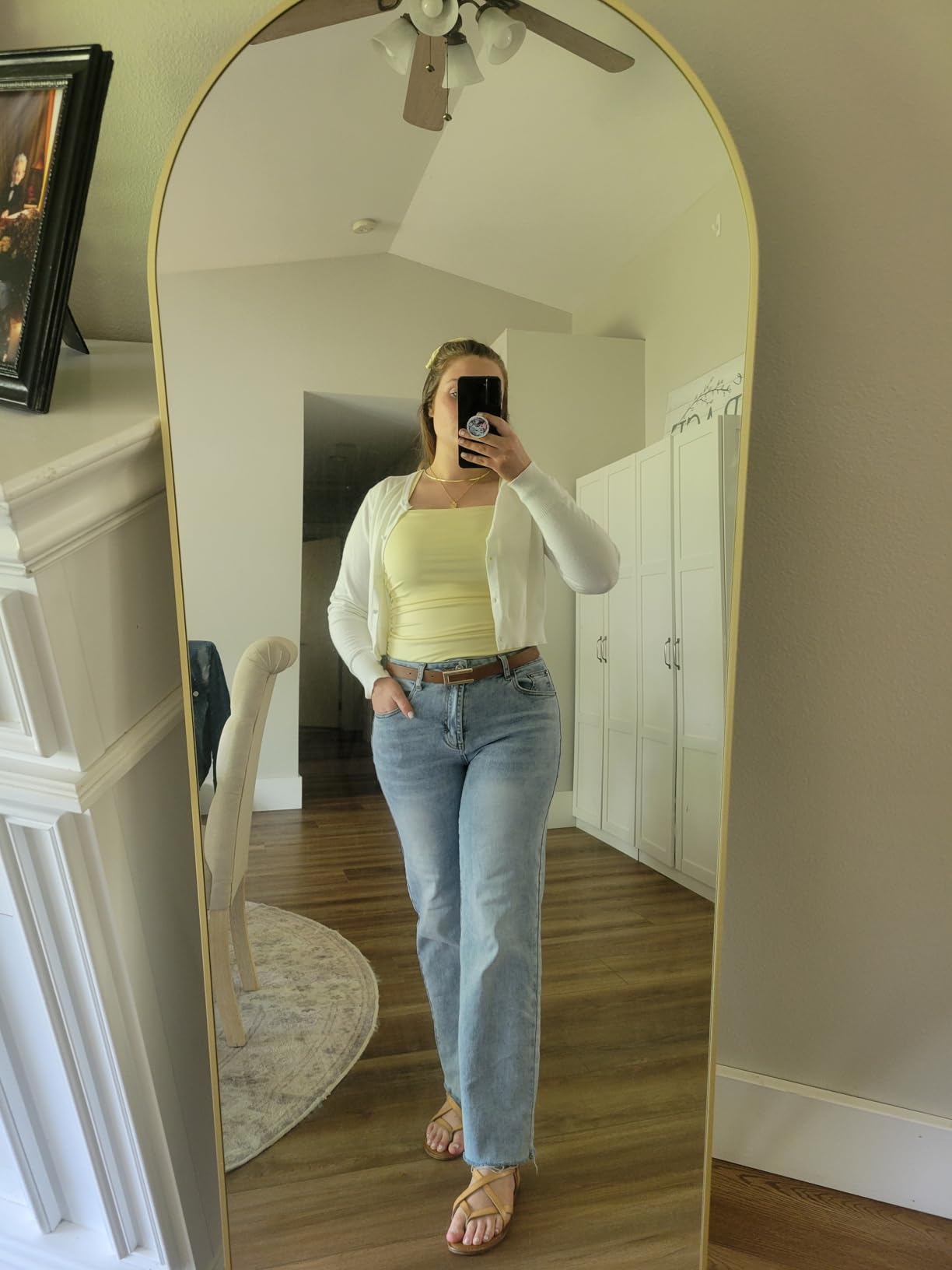 Black hoodie paired with straight-leg jeans outfit
