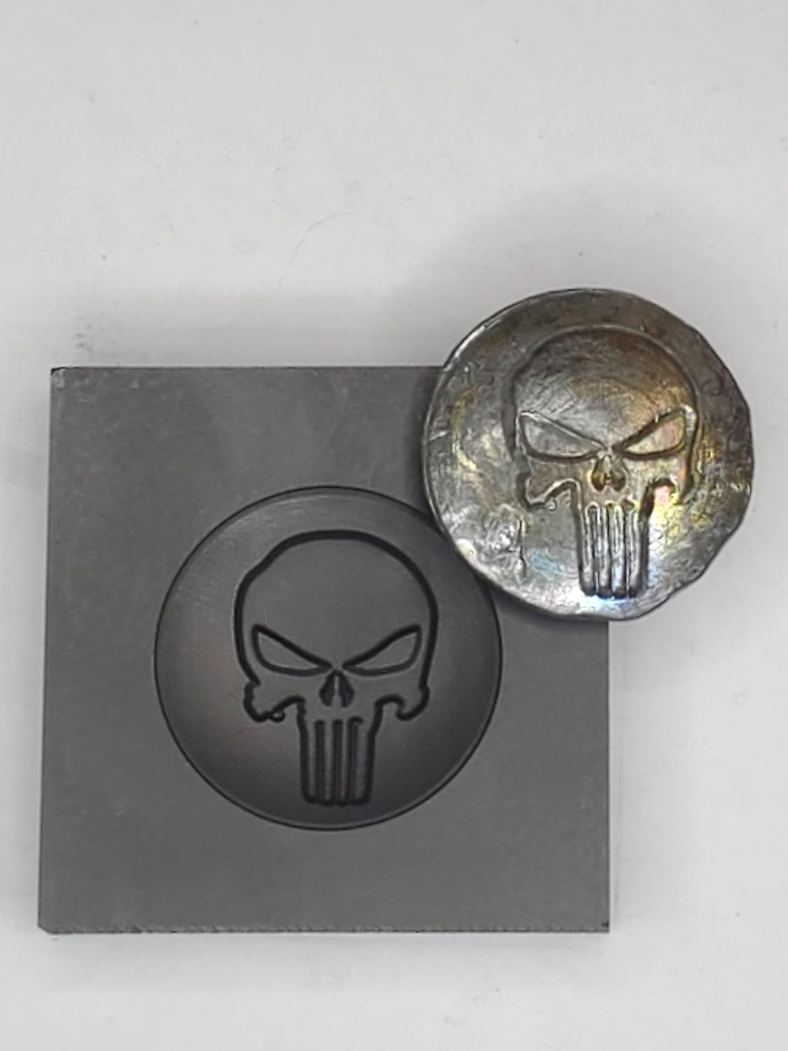 Graphite Mold Punisher Dome This Mold is Ideal for Casting a 3D Image. Works Great with Gold, Silver, Copper, Aluminum, Tin, and Other Precious and Non-Precious Metals. As Well as Pressing Glass.