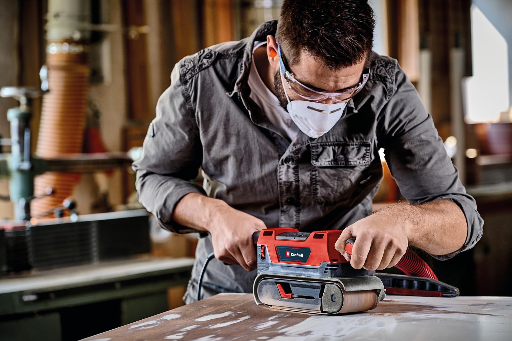 Einhell Lijadora de banda TE-BS 850 E (850 W, velocidad de la cinta abrasiva de 400 m/min, ajuste fino de la marcha de la banda, aspiración de polvo, también para uso estacionario, incl. accesorios)