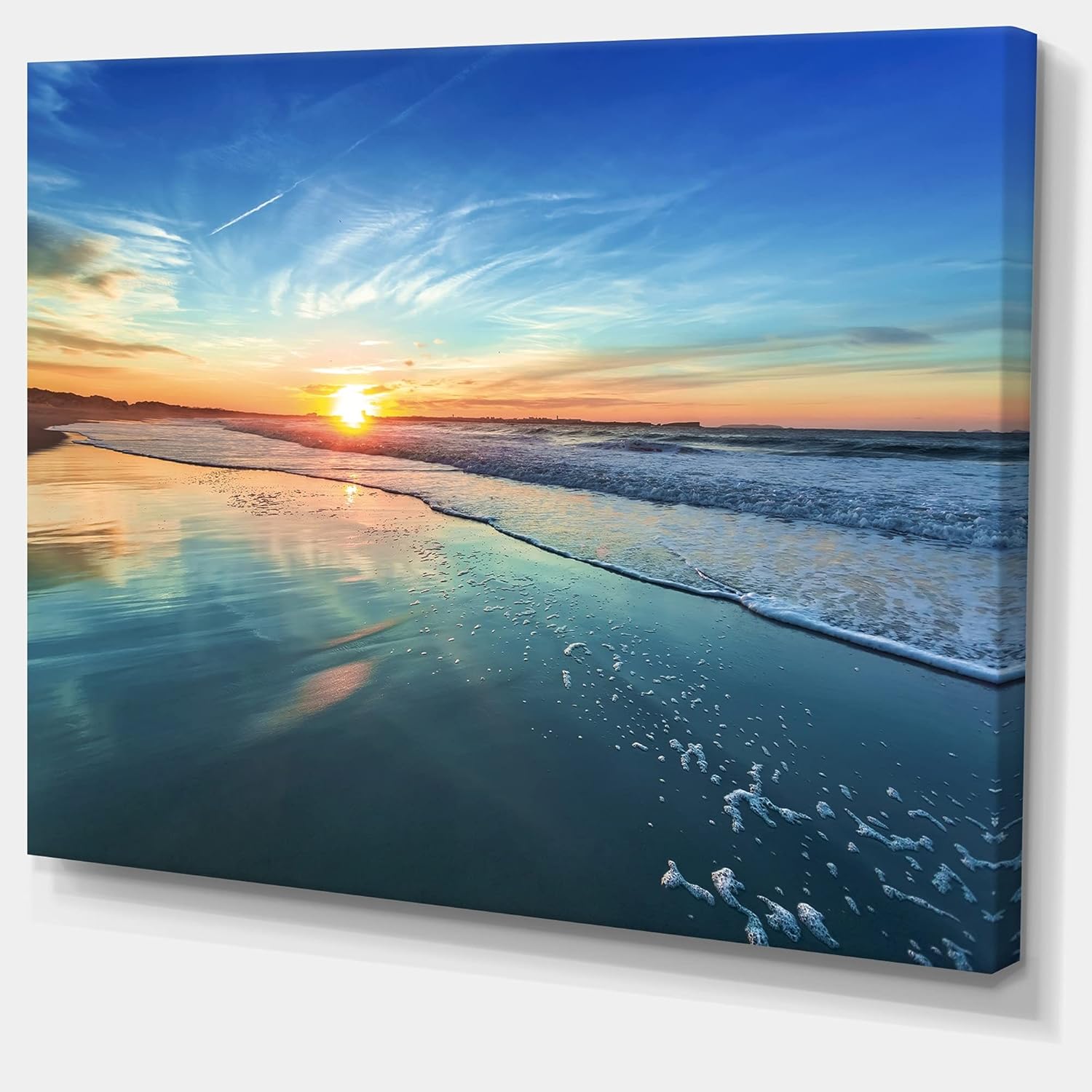 DESIGN ART Blue Seashore with Distant Sunset - Seashore Canvas Wall Art 46 in. Wide x 36 in. high