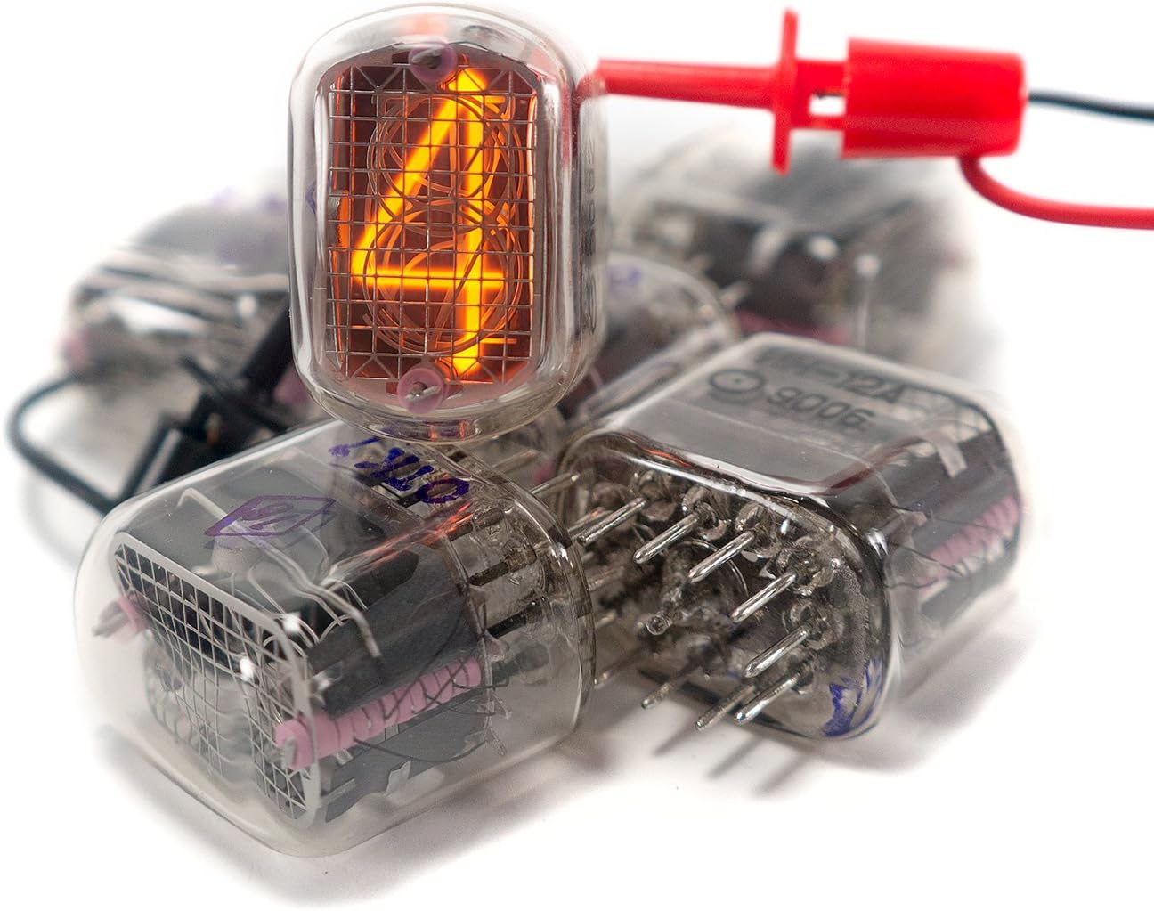 A single Vannamore IN-12A Nixie tube glowing orange, displaying the digit '4'.