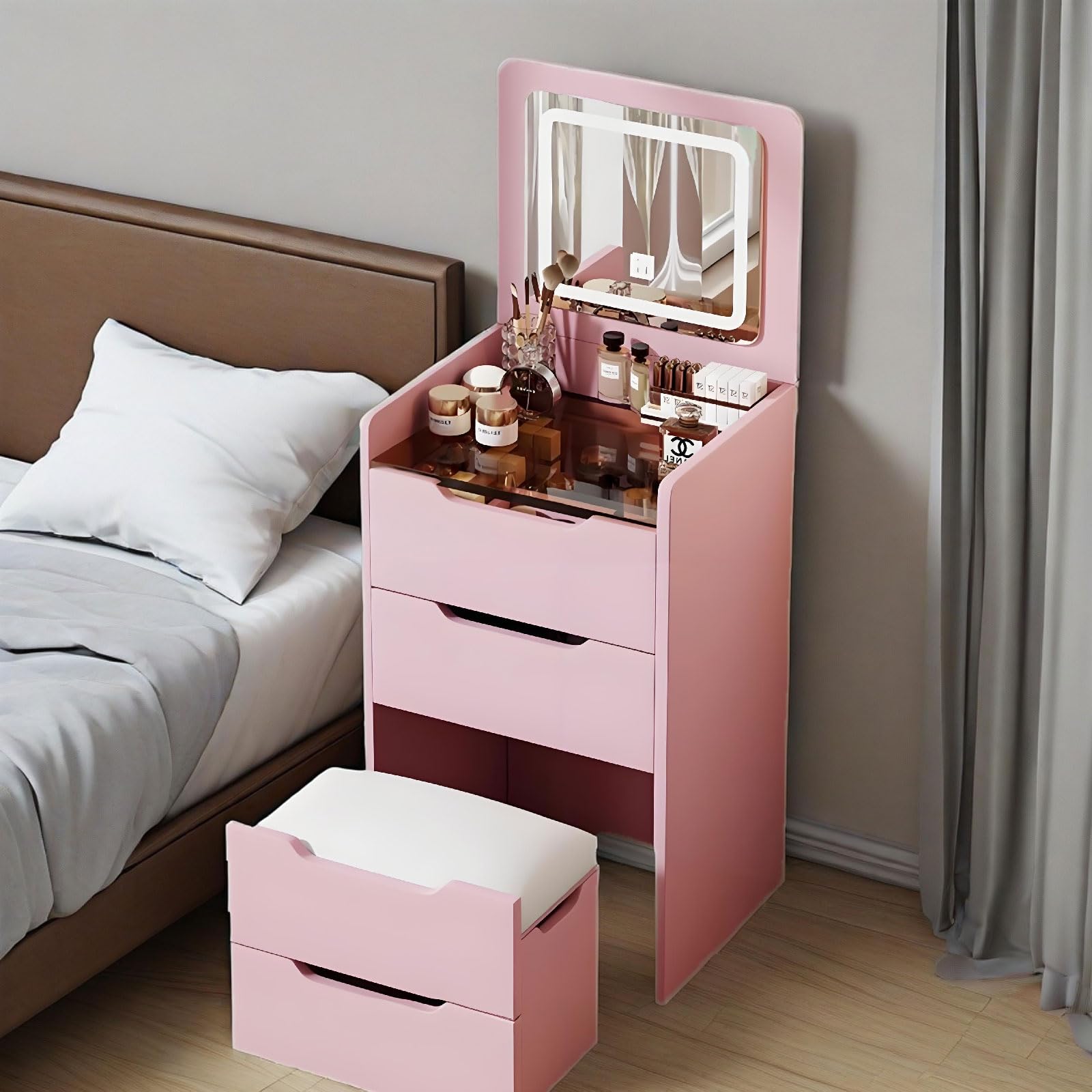 Tocador rosa con espejo de cristal elegante, mueble de maquillaje con luces