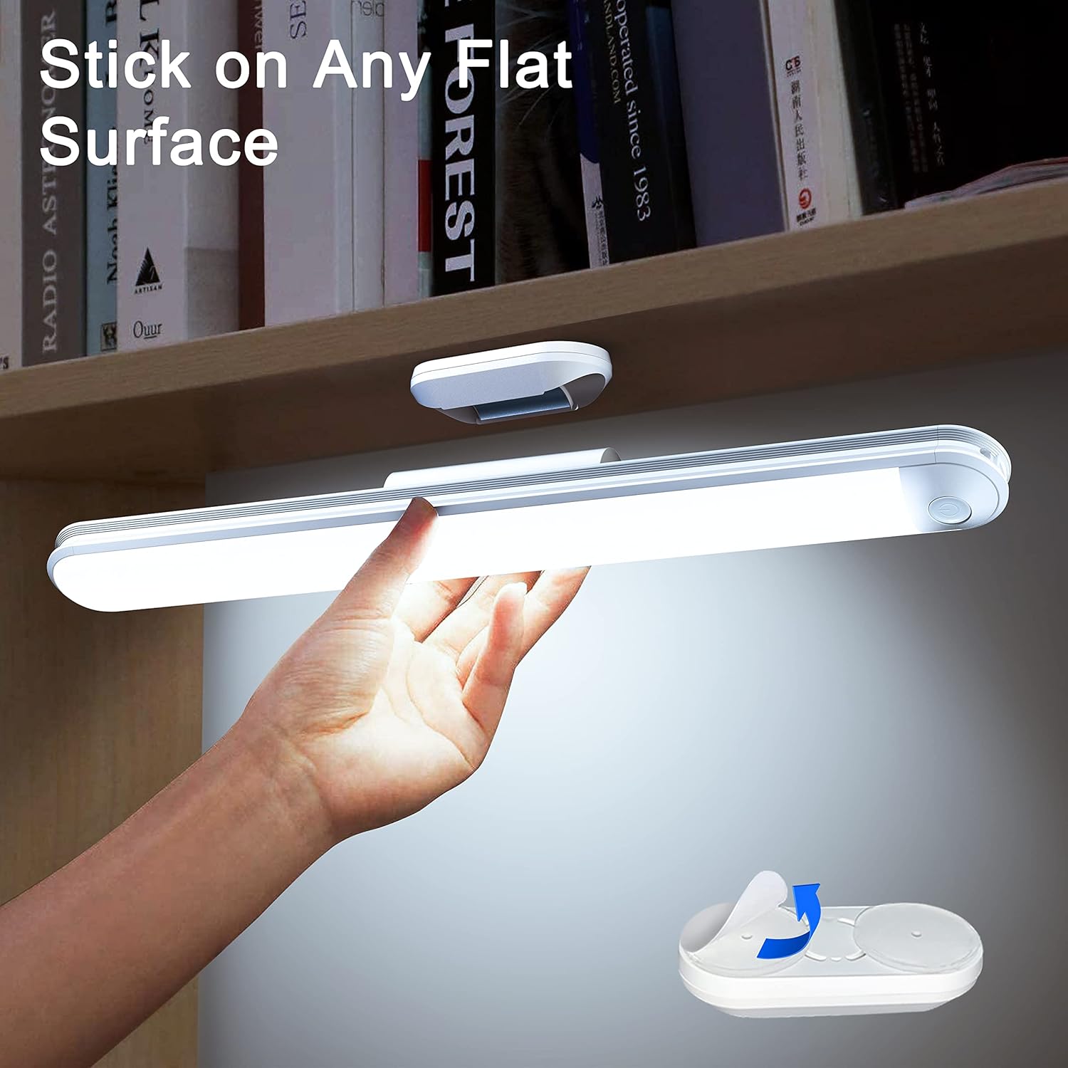 Hand attaching the light bar to a magnetic mount on a flat surface under a shelf.