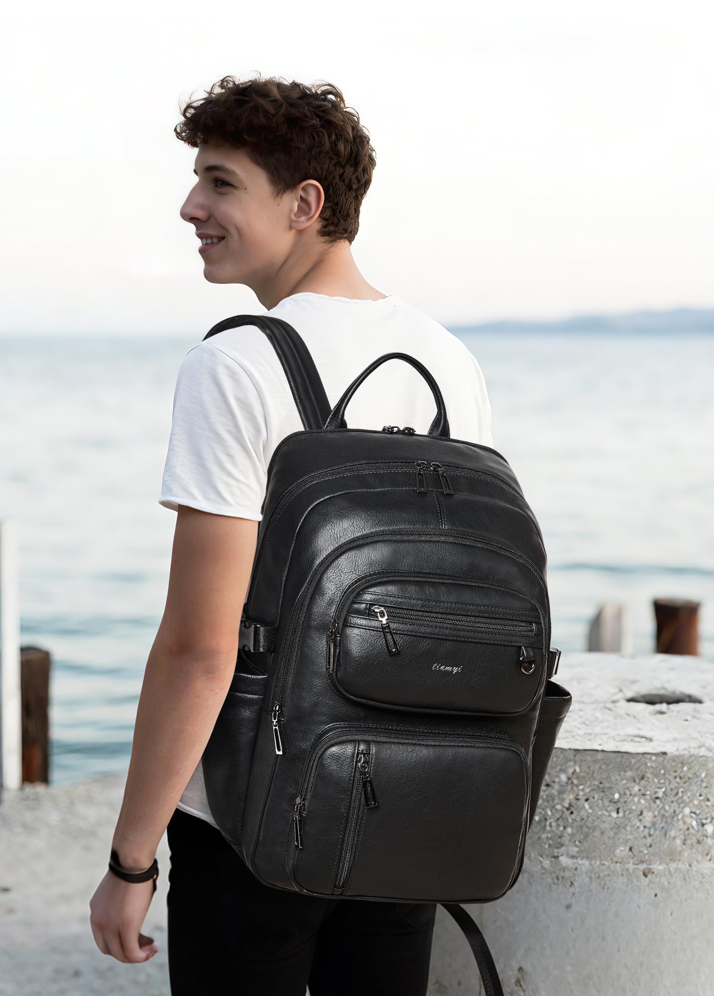 Mochila de cuero vegano, mochila de viaje TSA para hombres y mujeres, se adapta a laptop de 17.0 pulgadas con correa de equipaje, color negro