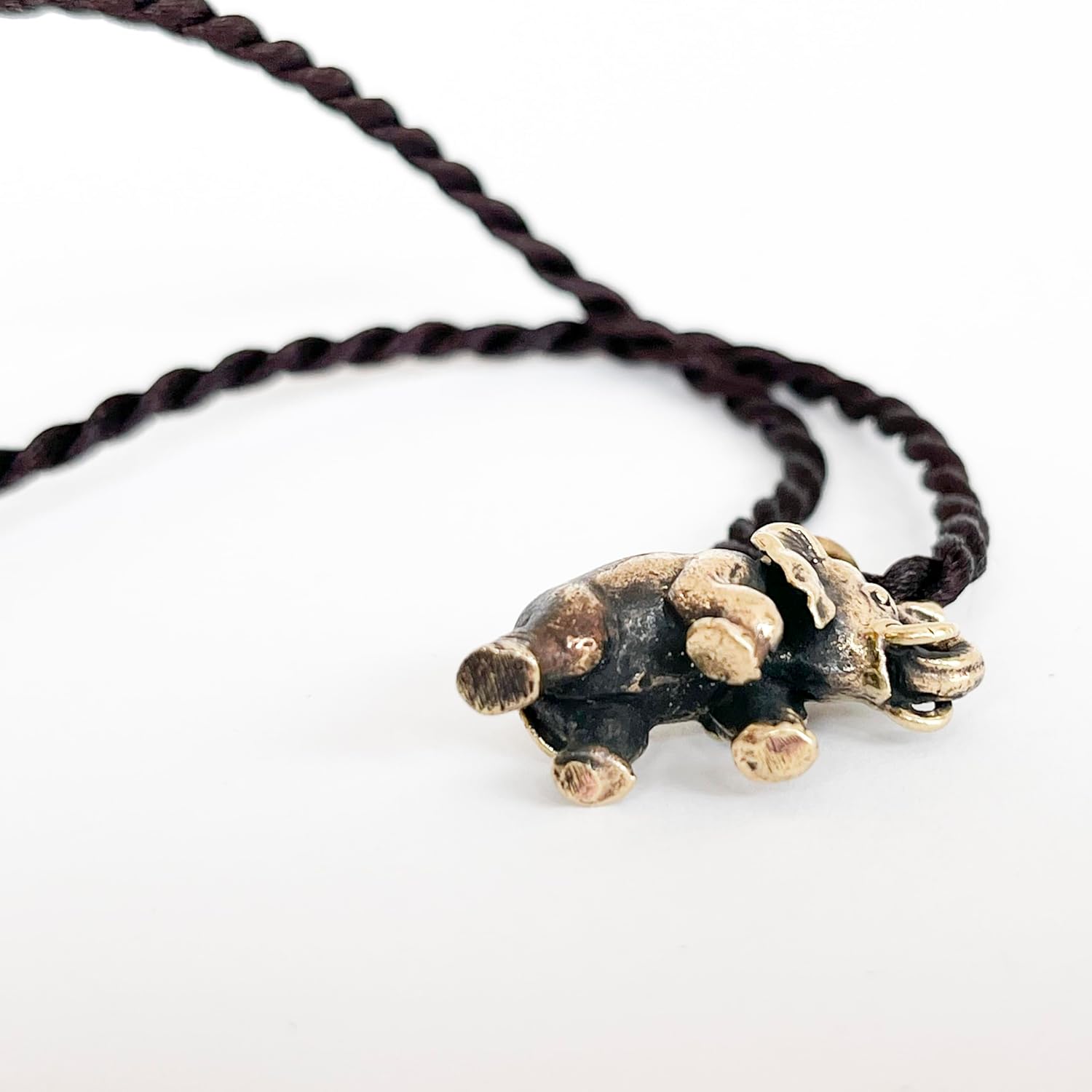 Artschatz Elephant brass Pendant - walking with trunk up