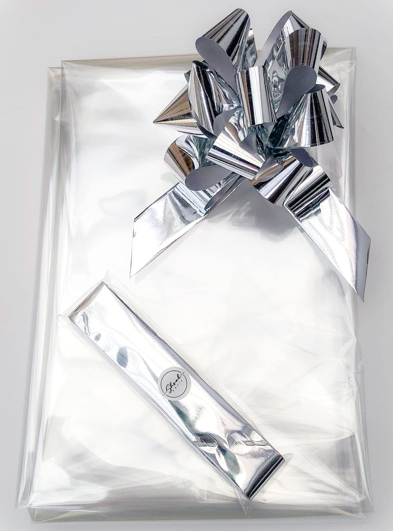 ShredAstic® Clear Florist Cellophane wrap with 30mm Pull Bow (2 metres, Metallic Silver)