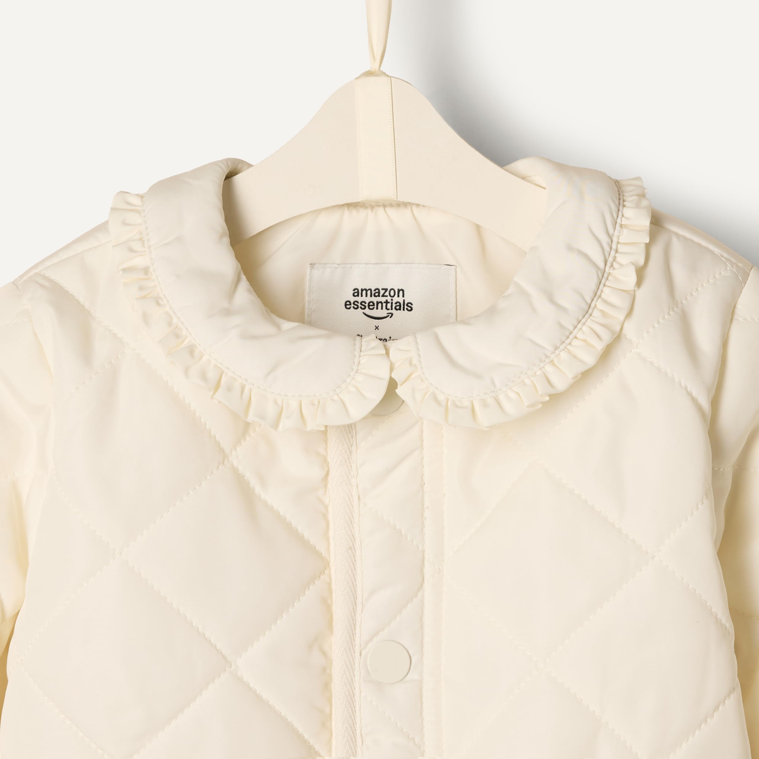 Amazon Essentials x Sofia Grainge Chaqueta Acolchada con Volantes Bebé y Niña Pequeña