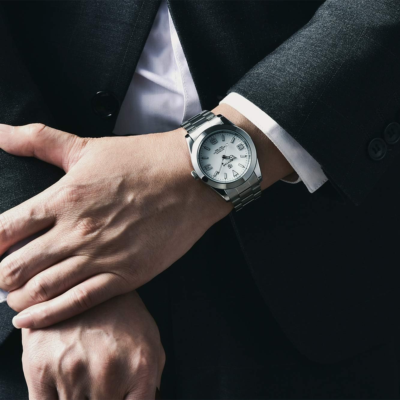 BENYAR 5177 watch on a man's wrist, worn with a business suit