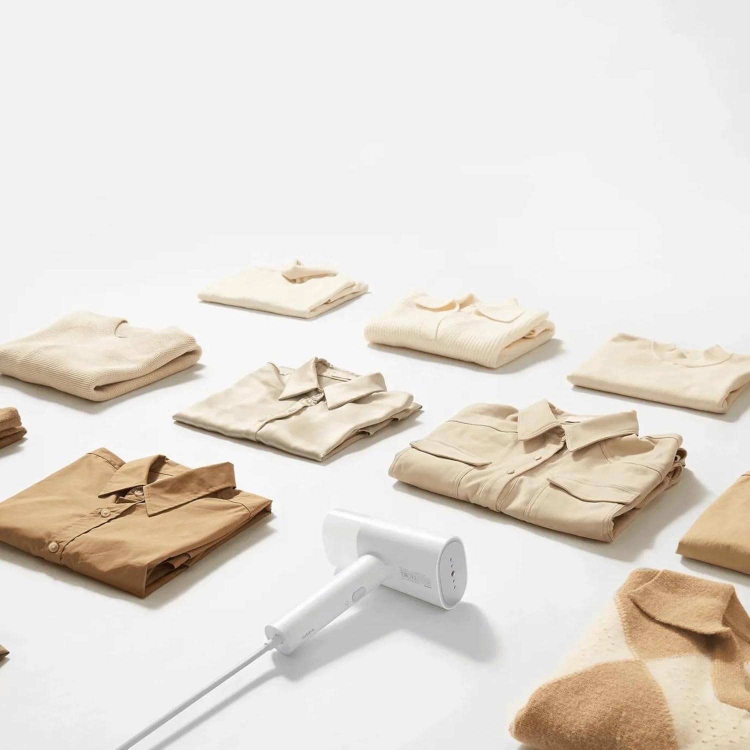 Xiaomi Handheld Garment Steamer packed neatly in a suitcase.