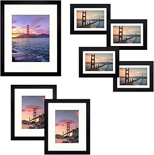 Frametory, Gallery Wall Frame Set of 7 Multiple Sizes 11x14, 8x10, 5x7 Picture Frame Collage with Ivory Color Mat for Prints, with Real Glass (Black)