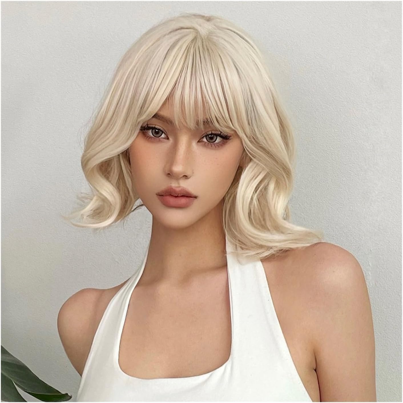 Nuxovin Platinum Blonde Human Hair Wigs Wavy Bob with Bangs Heat Resistant Tangle-Free Curls Lightweight for Versatile Styling (Platinum,14inch)