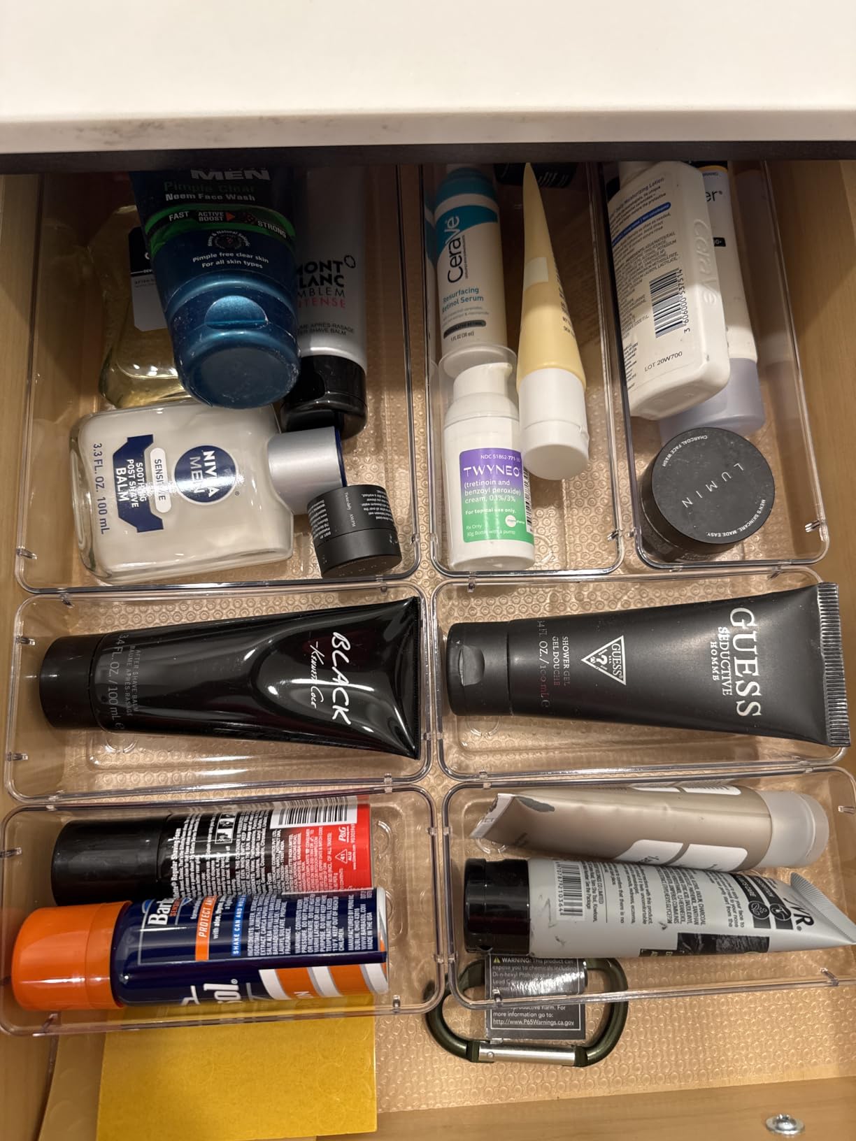 Vanity drawer organized into trays by category