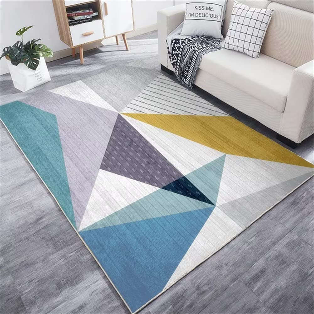 Tapis de salon géométrique bleu idéal pour réchauffer une salle d'étude