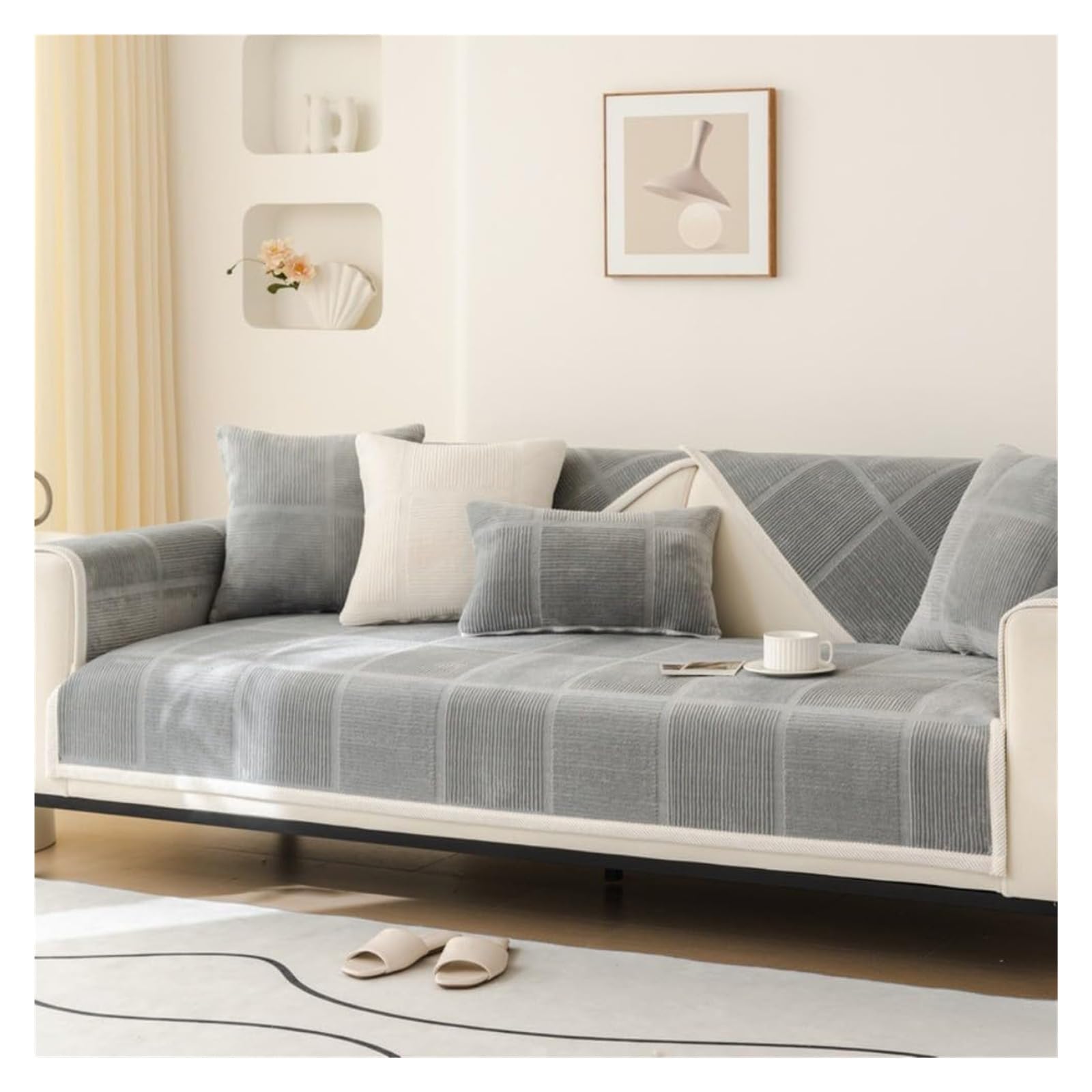 Protégez votre canapé en L des taches avec cette housse extensible et moderne
