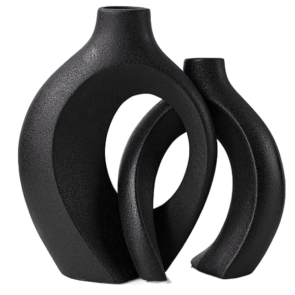 Elegant Coffee Table Centerpieces That Refresh Your Living Room 20 Modern Black Hollow Ceramic Vases