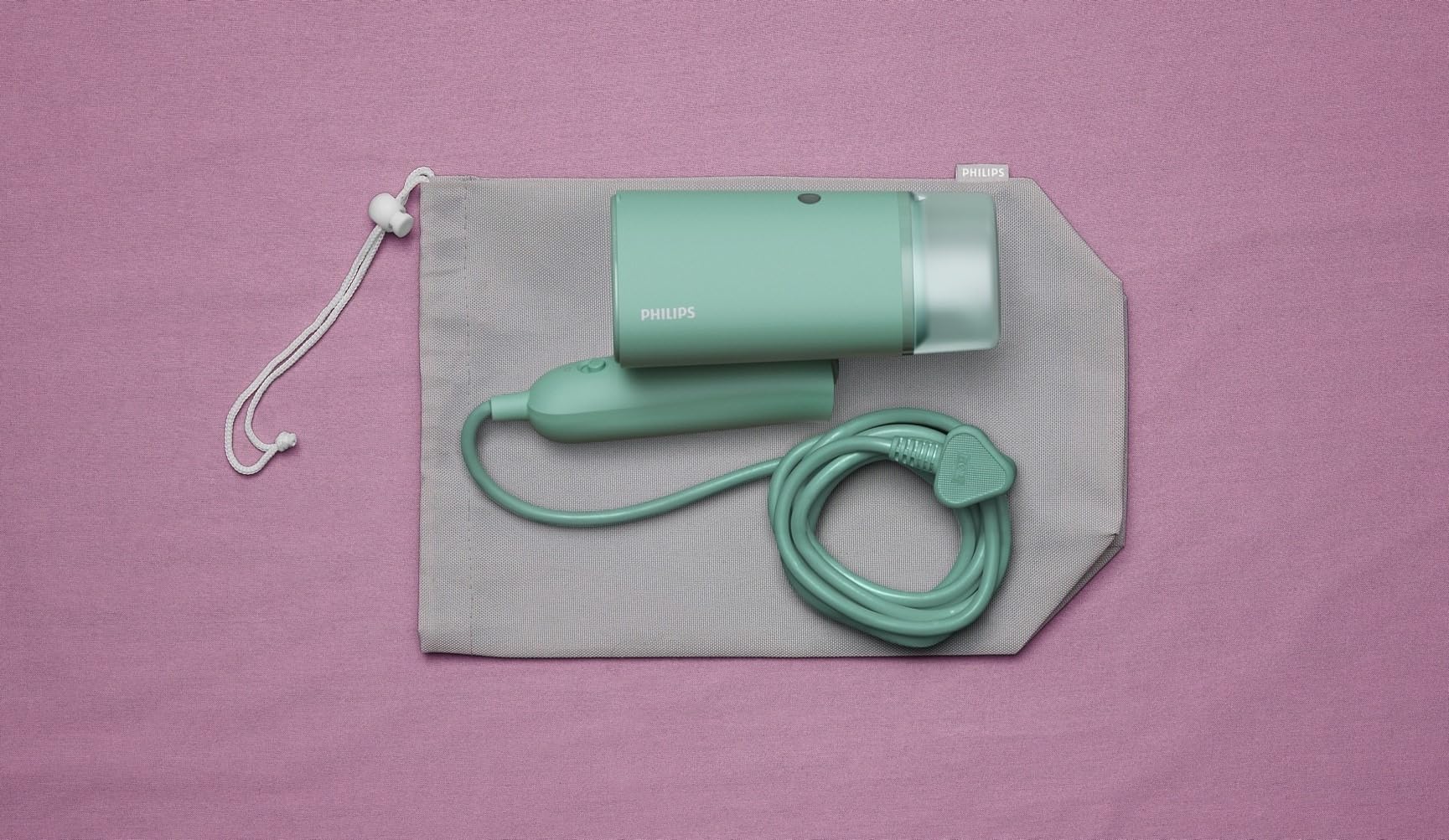 Philips 3000-Serie Tragbarer Dampfglätter - 1000 W, Kompakt und Faltbar, 100ml Wassertank konstante Dampfleistung 20 g/min, Kein Bügelbrett erforderlich, Grün (STH3010/70)