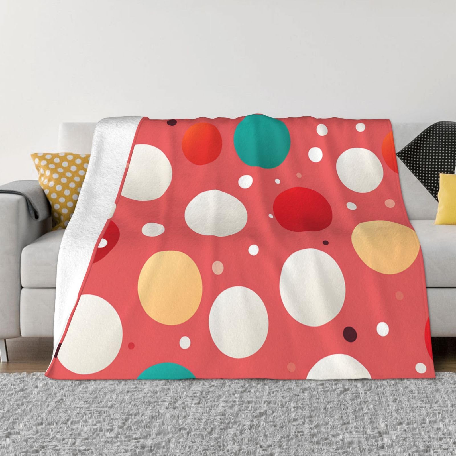 Couverture polaire cocooning pour vos soirées cinéma sur le canapé