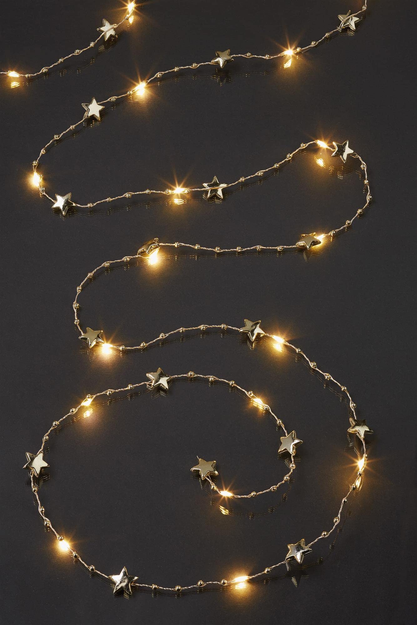 hellum LED Kupfer-Lichterkette Tauperlen, goldene Sterne, 20 warmweiße LEDs, 190 cm Lichtlänge, Kabelfarbe silber und gold, Indoor, batteriebetrieben (3AA), 521597