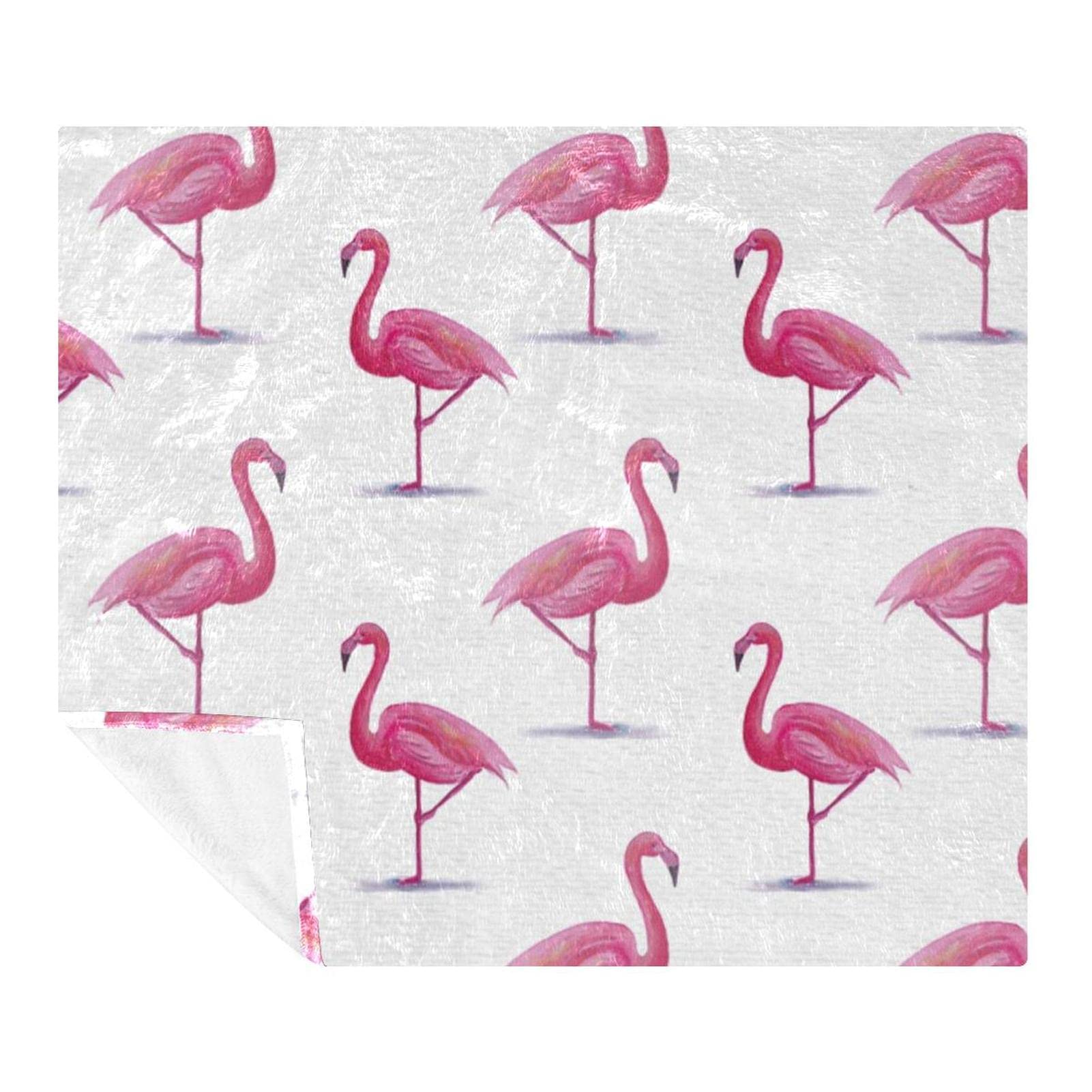 Plaid doux microfibre flamant rose contre le froid sur le canapé