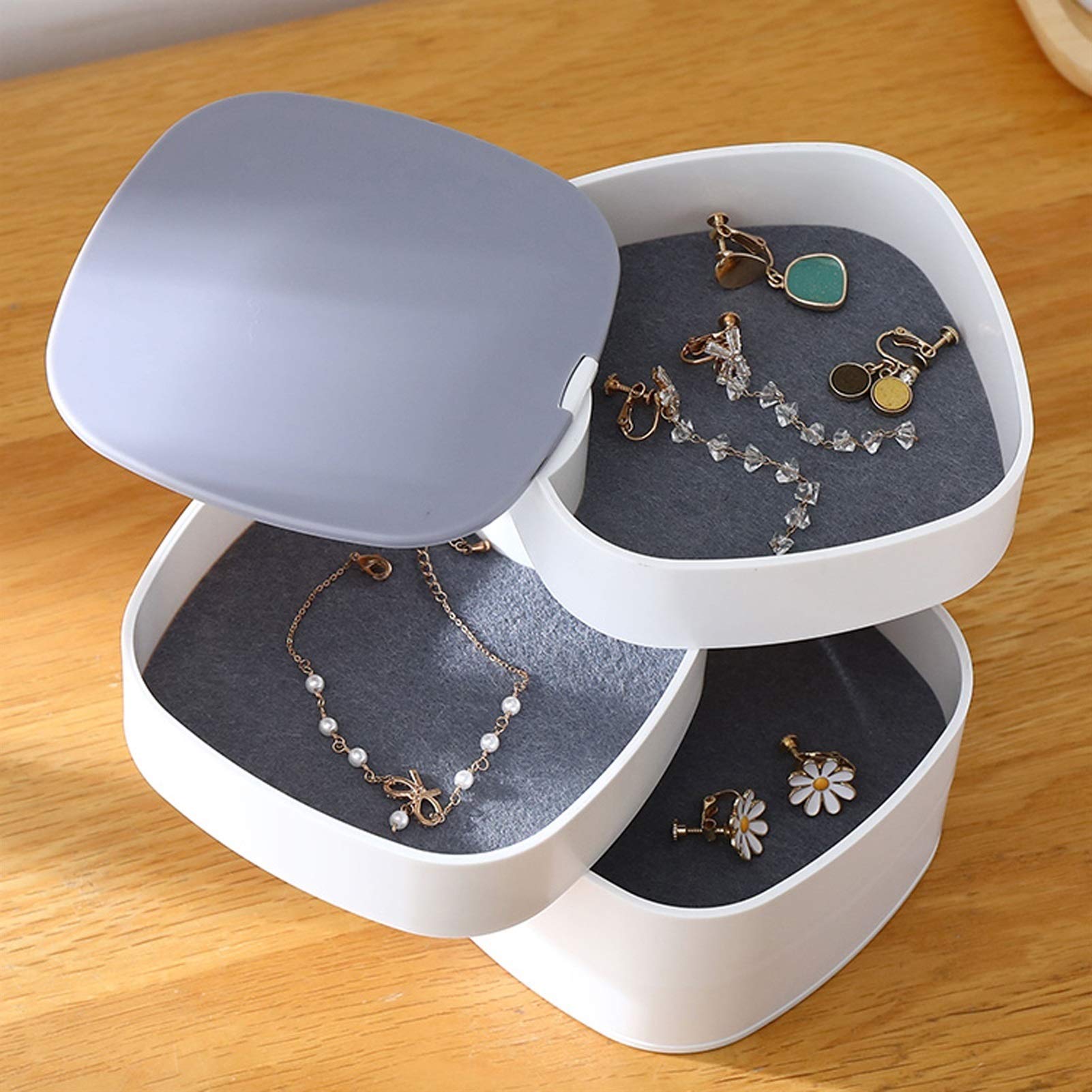 HDBCYUAZ Small Jewelry Organizer Box Portable Travel Round 4-Layer Rotating with Mirror for Earrings Holder and Rings Bracelets Storage(Gris)