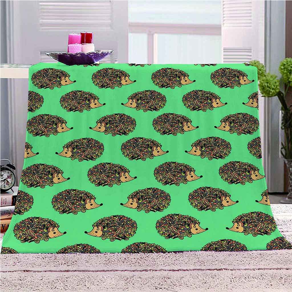 Couverture canapé hérisson vert pour vos soirées cocooning au salon