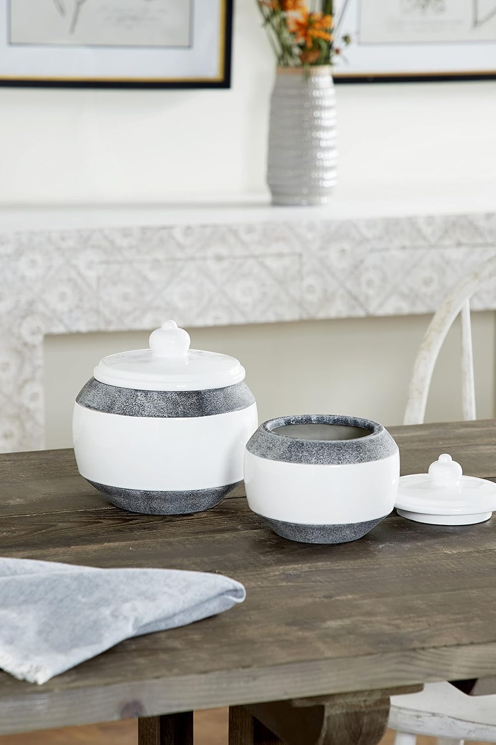 Deco 79 Round Textured Matte Gray & Glossy White Ceramic Jars with Lids, Set of 2: 7” x 7.5”, 6” x 6”