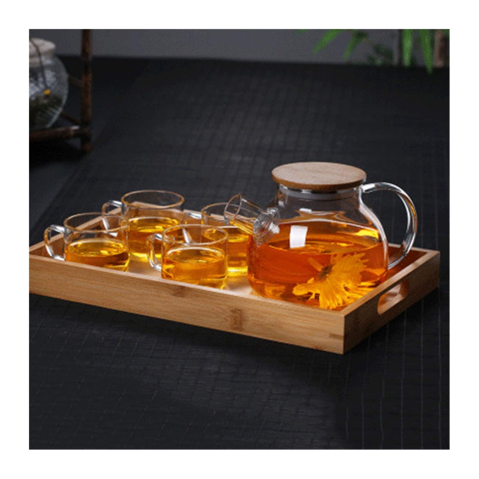 Théière en verre pour partager une citronnade fraîche en famille