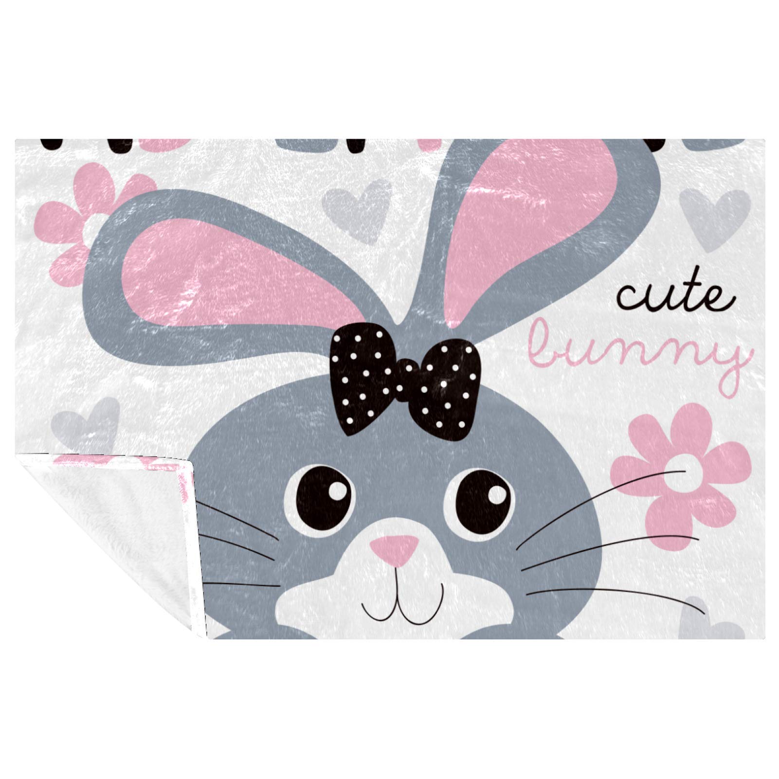 Couverture chaude lapin pour des moments de tendresse en famille au lit
