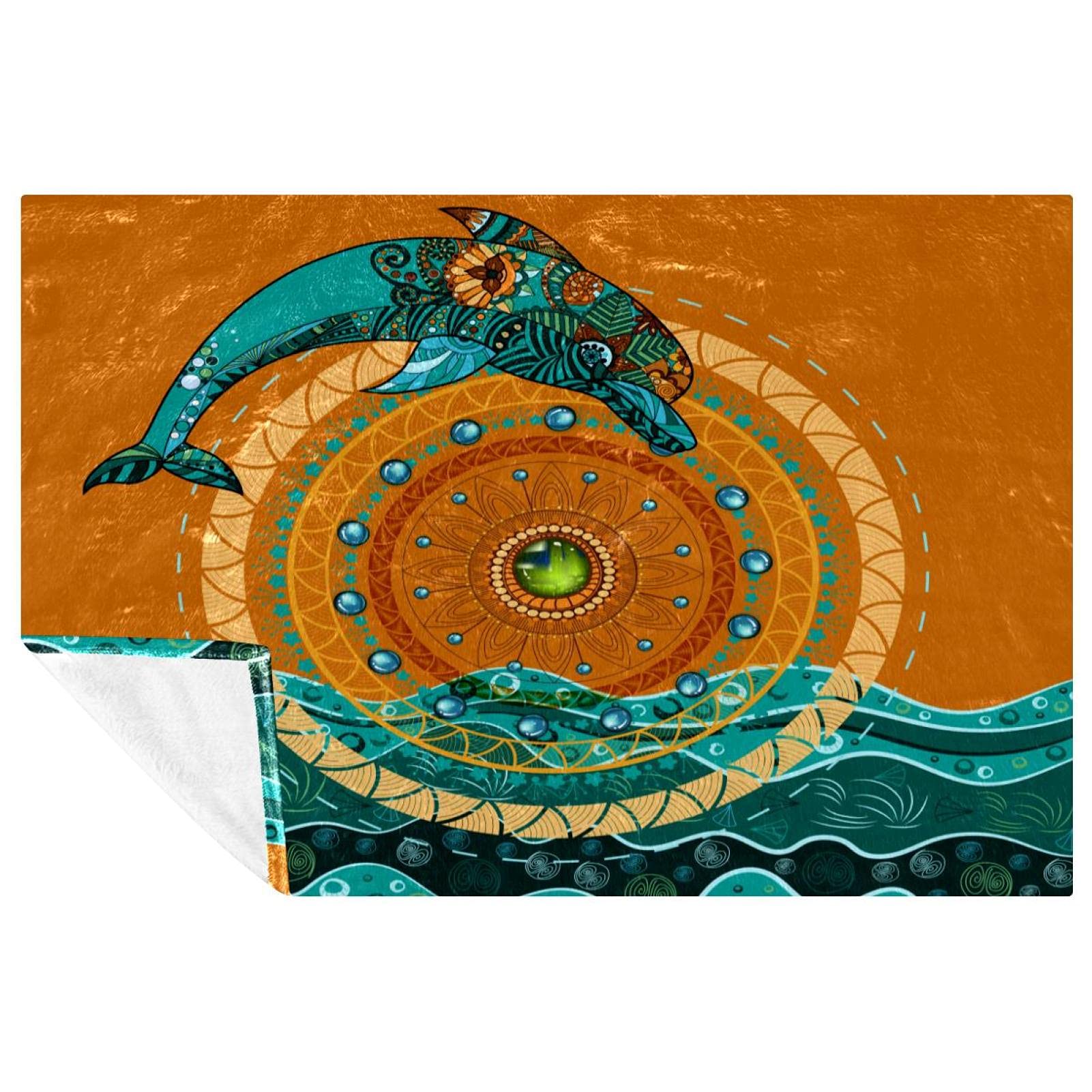 Couverture douce dauphins pour vos soirées canapé et sorties plage