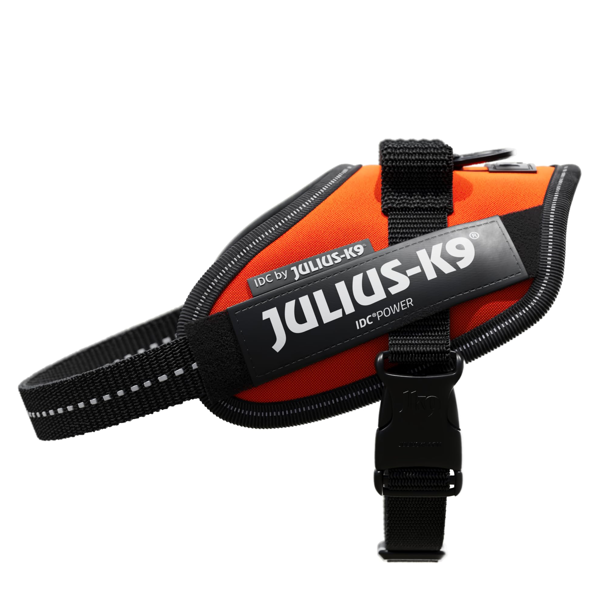 Gros plan sur le harnais Julius K-9 IDC Power Neon Orange, mettant en évidence la sangle pectorale et la poignée de contrôle.