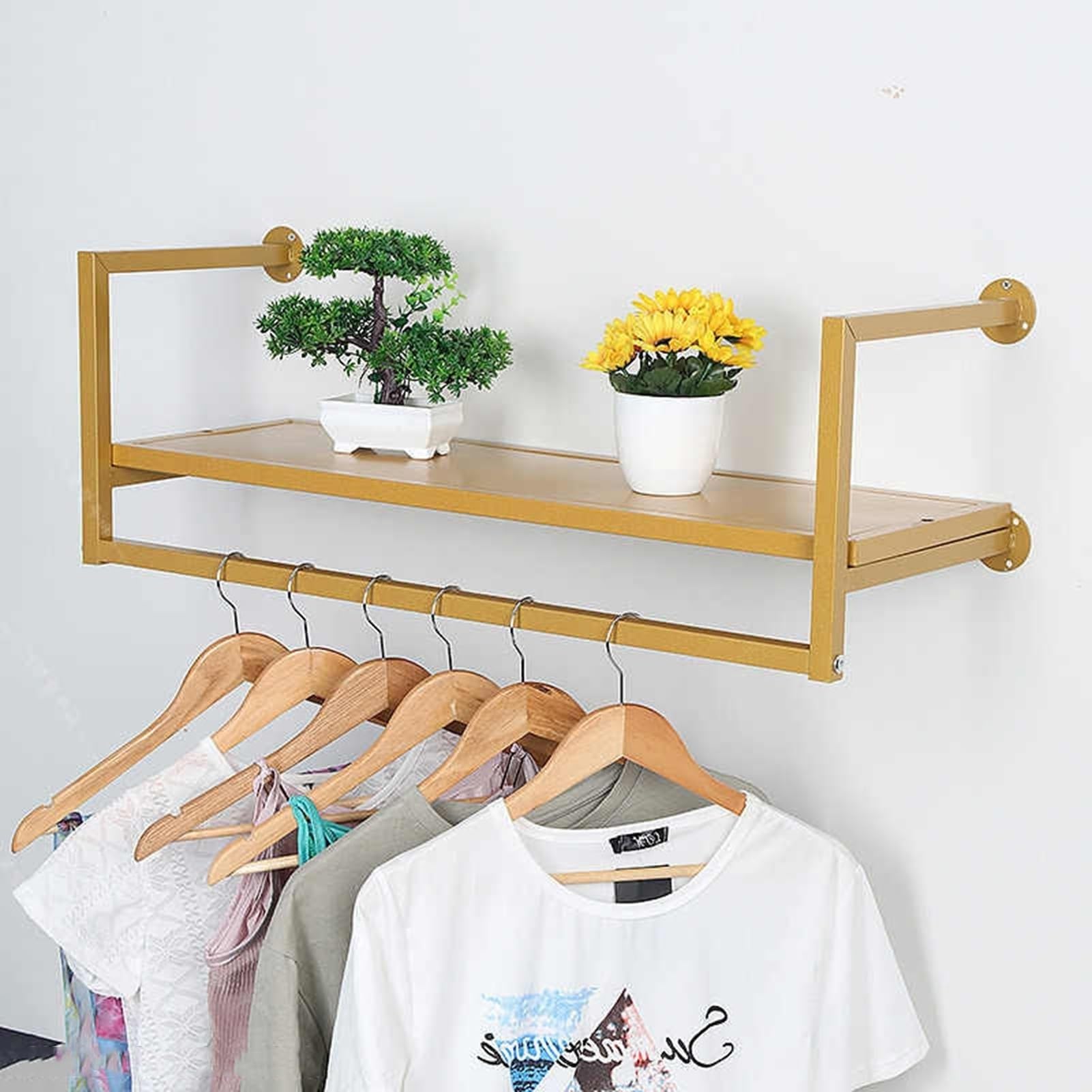 Présentoir mural doré pour vêtements pour en finir avec le désordre