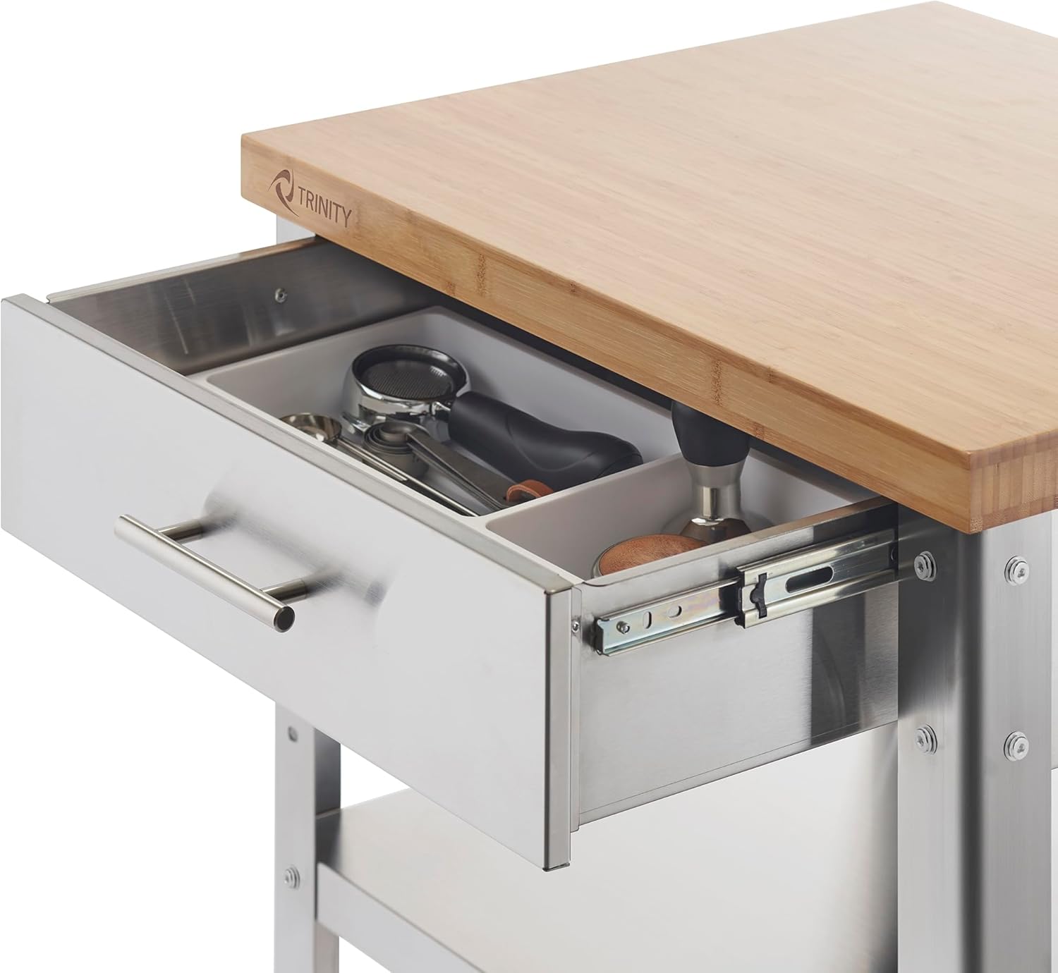 Жакын план view of the fully-extendable drawer of the TRINITY kitchen cart, showing its interior with small items.