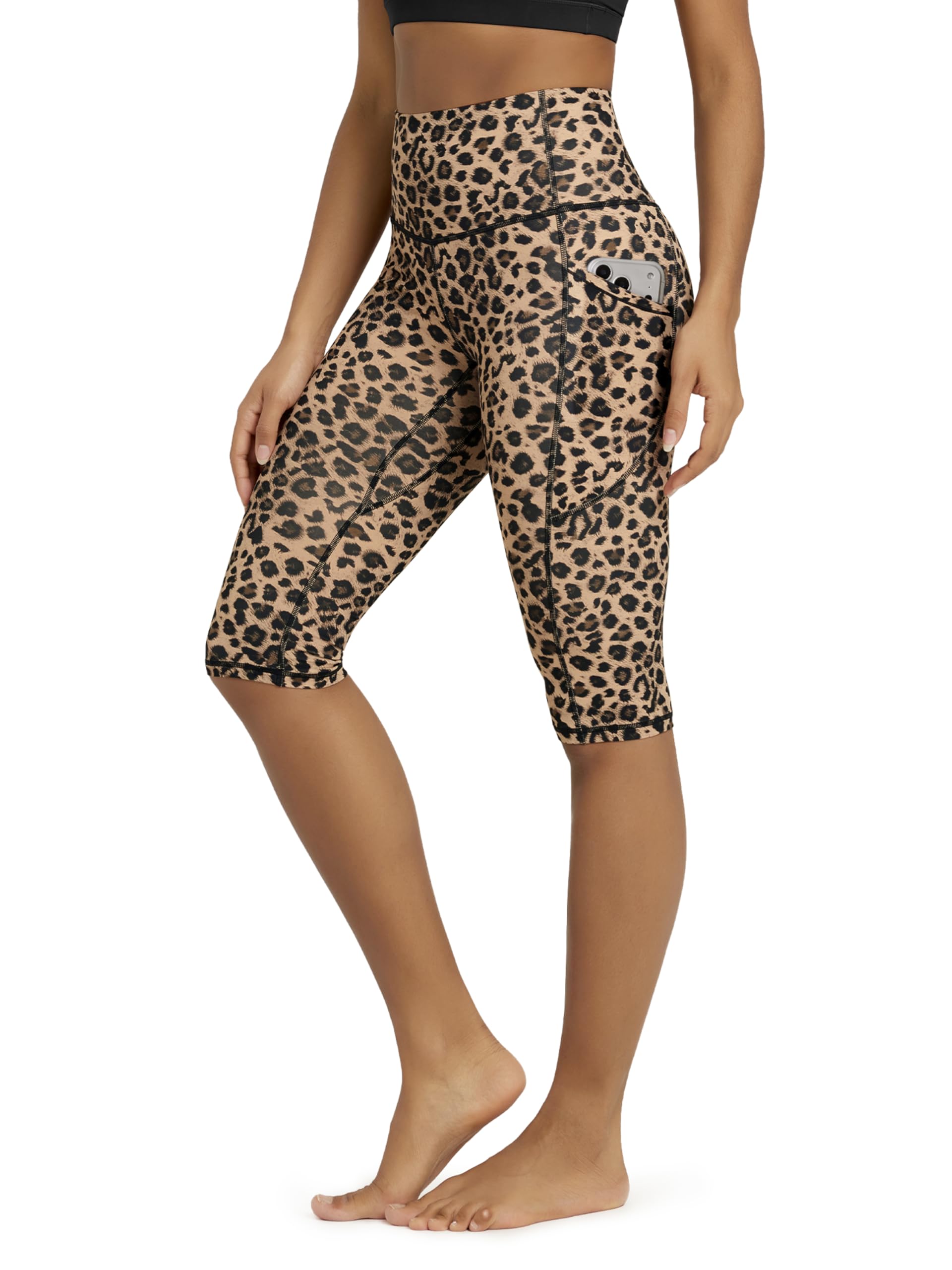 ODODOS Women's High Waisted Yoga Capris with Pockets, Tummy Control Non See Through Workout Athletic Running Capri Leggings