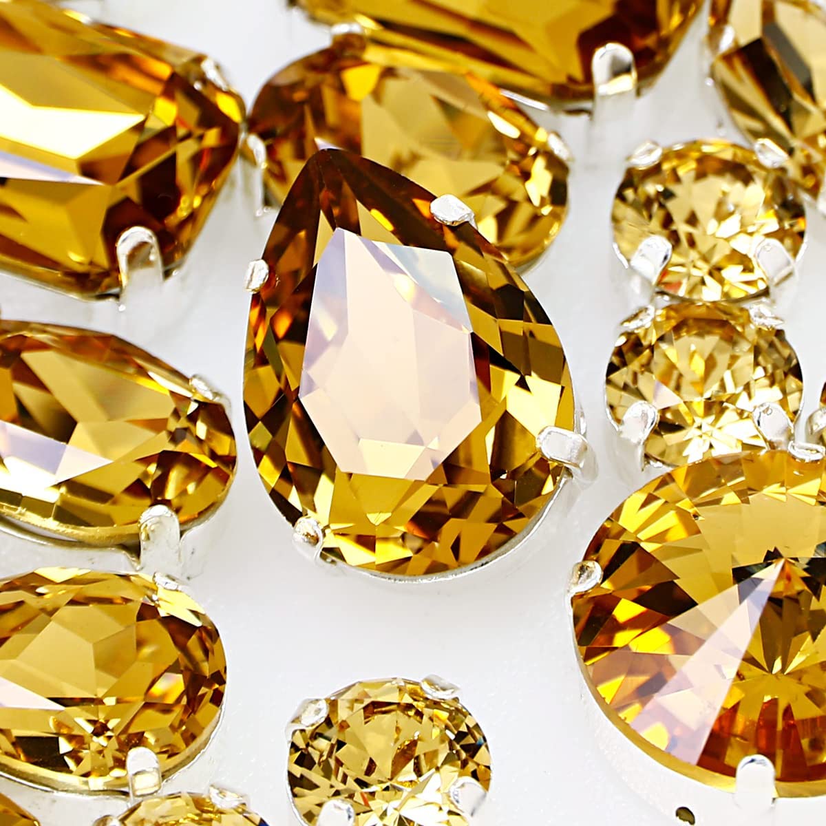 DONGZHOU Strass da cucire con artiglio d'argento, da cucire, con strass, per gioielli, fai da te, vestiti, scarpe, decorazione per matrimoni, 82 pezzi, topazio colorado chiaro