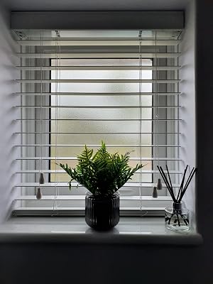 white thick wooden blinds