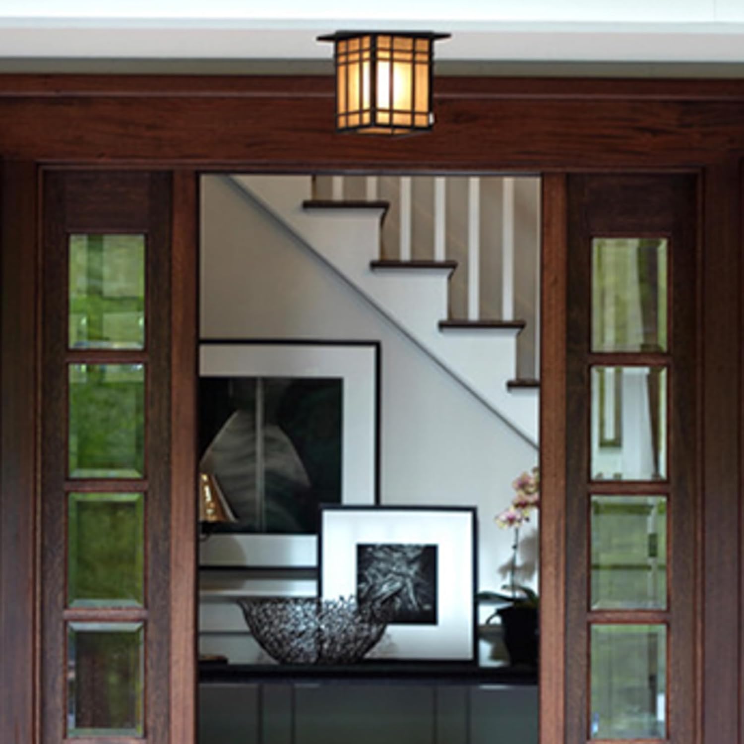 Close-up view of the Imperial Bronze finish and white linen textured glass panels of the Quoizel Hillcrest outdoor lantern.