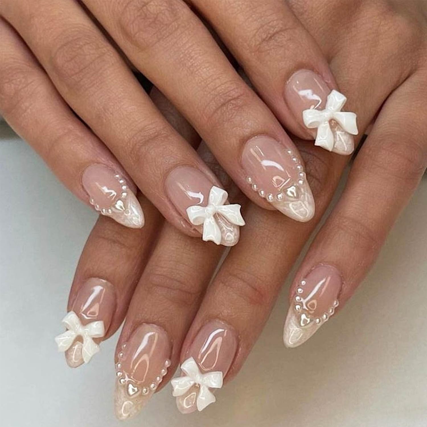 Photo 1 of 24pcs Almond Shaped Artificial Nails - French Tips with Cute Bow Charms Design - Nude Pink Acrylic Nails for Women & Girls