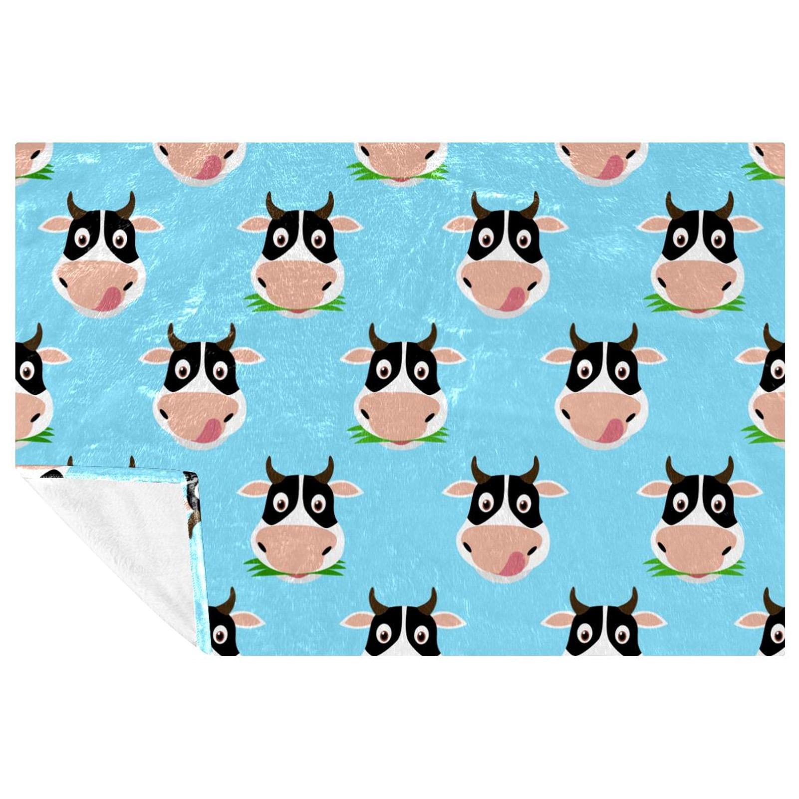 Couverture douce motif vache bleu contre le froid de lit