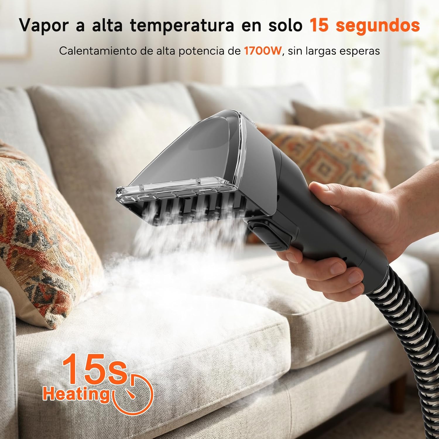 Hand holding the cleaner head, spraying steam onto a sofa