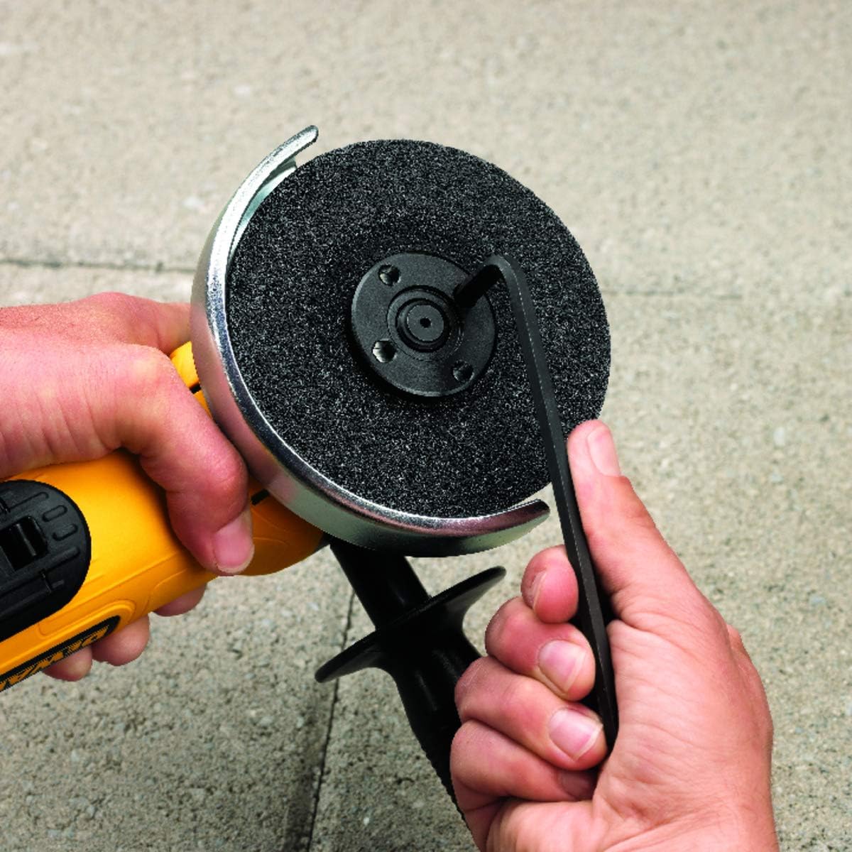 Changing grinding disc on DEWALT DWE4120B Angle Grinder