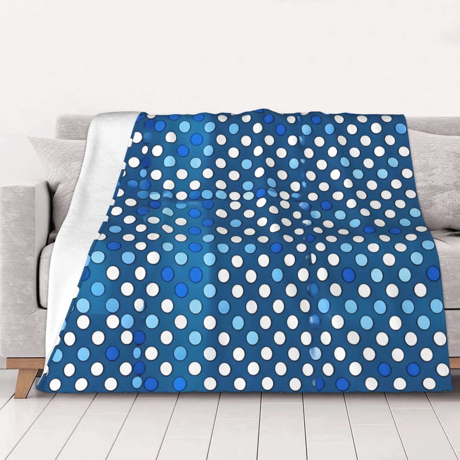 Plaid bleu à pois ultra doux pour des soirées cocooning au salon
