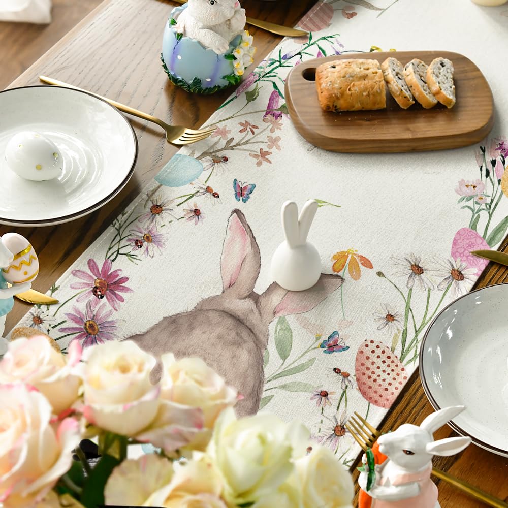 Lief vrolijk geboortekaartje met konijntjes en bloemen