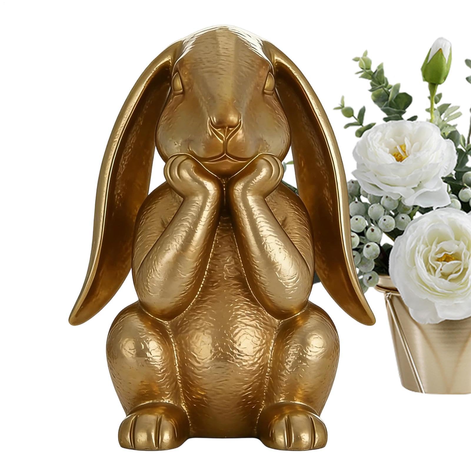 Lapin doré de Pâques en position pensée pour décoration de table