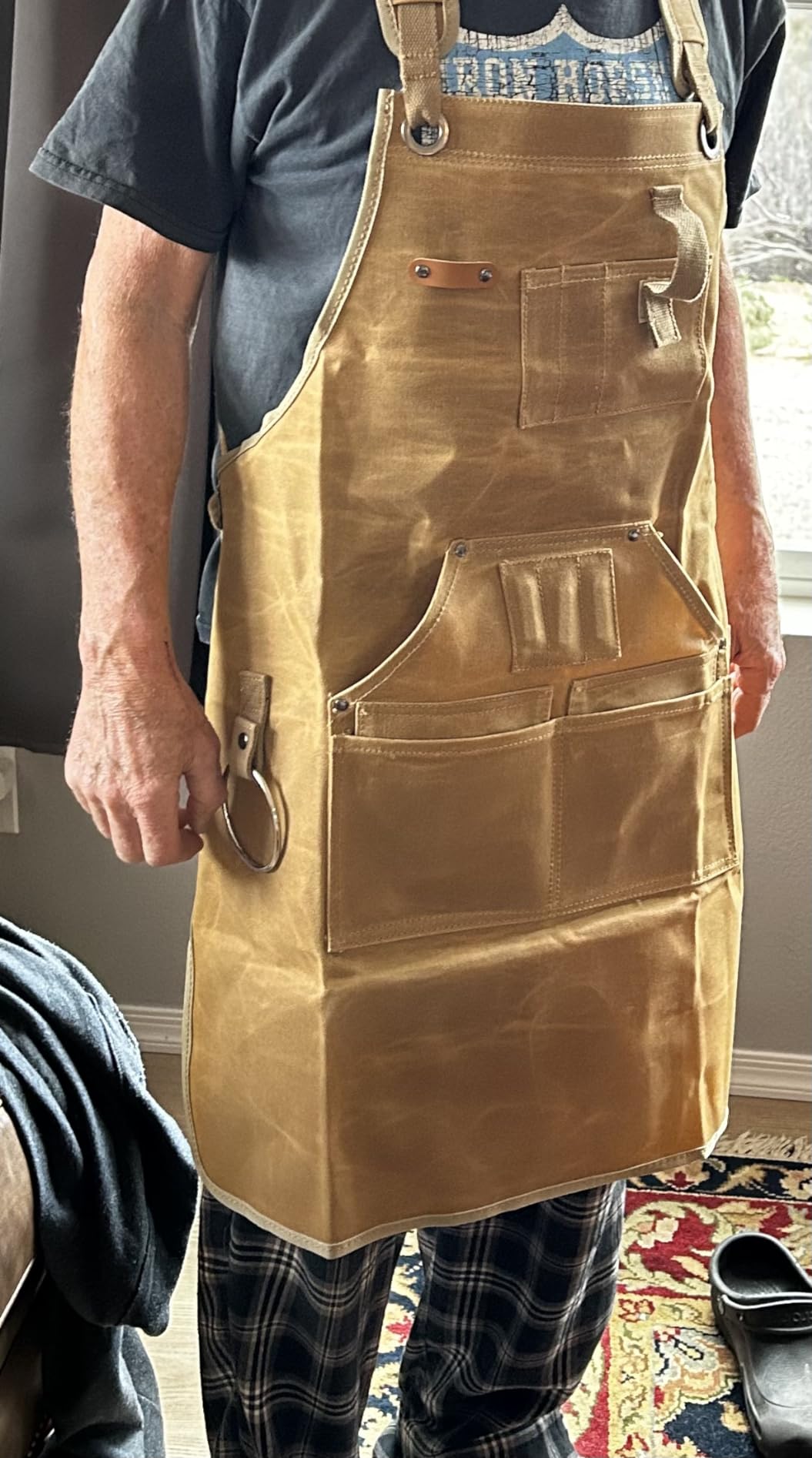 Woodworker wearing a shop apron with tool pockets