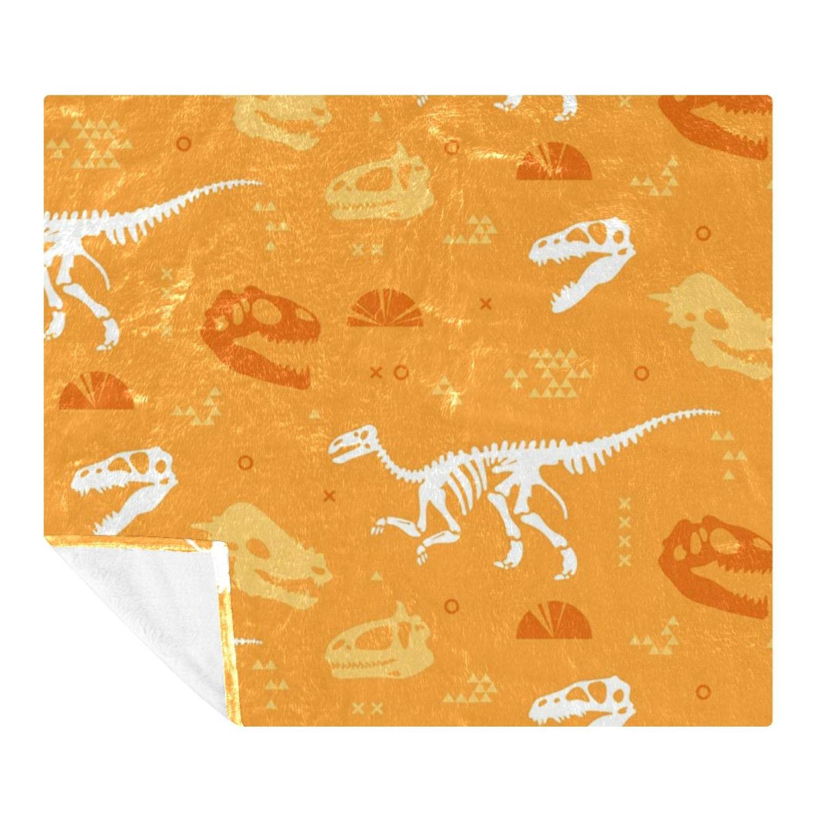 Couverture douce dinosaure pour vos soirées canapé et voyage