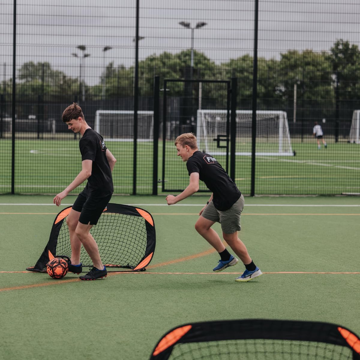 Flick Urban Pitch Pack | Portable Football Pitch Includes 2 x Compact Pop-Up Goals, Pitch Marker and Backpack