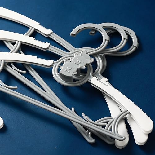 Miniatura 9 de Perchas de bebé para guardería y clóset, paquete de 40 perchas de plástico para niños, ahorro de espacio, antideslizantes, extensibles, ajustables,