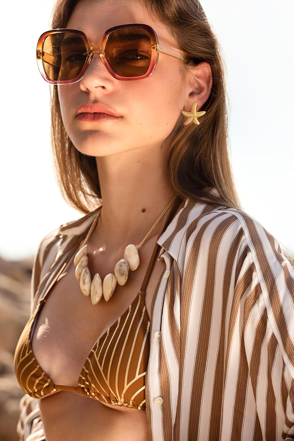 Worn Gold Conch Earrings And Starfish Earrings
