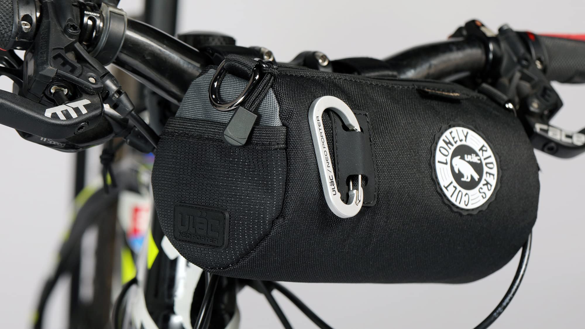 ULAC COURSIER Sprint, Neo Porter, torba na karmę rowerową, 1,5 l, z przednim oczkiem, pomieści światła i okulary przeciwsłoneczne oraz paskiem na ramię dla łatwego transportu, czarno-szara